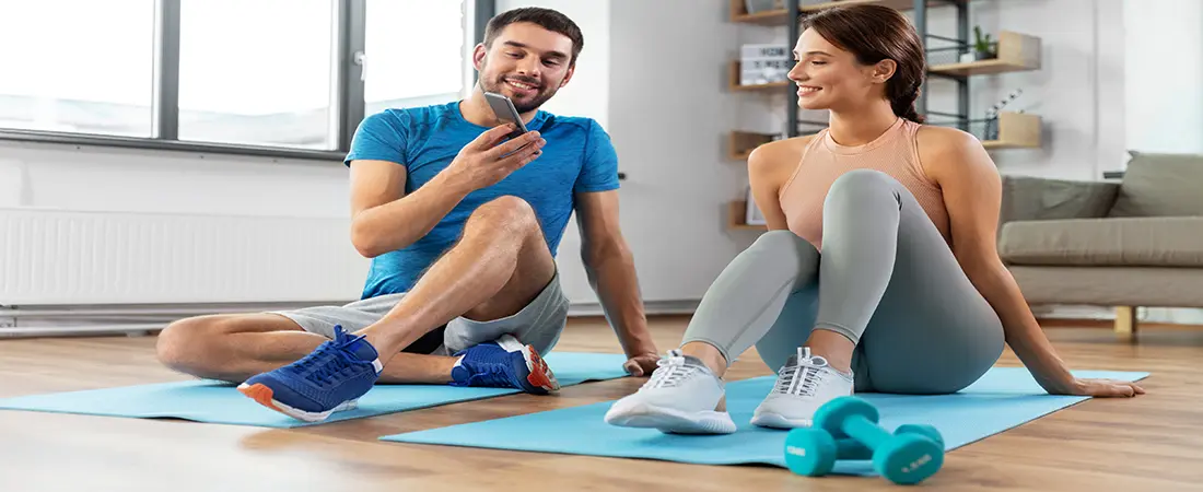 male and female online personal trainer giving training for online partner 